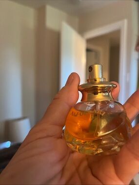 Handheld Glass Perfume Bottle — Amber Liquid
